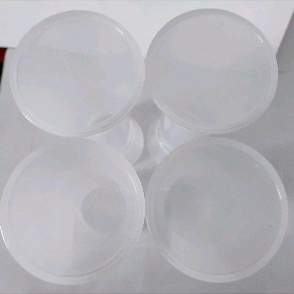 4 Tupperware Hourglass Salt & Pepper Shakers #718 Sheer Blue w/ Lid 5 7/8